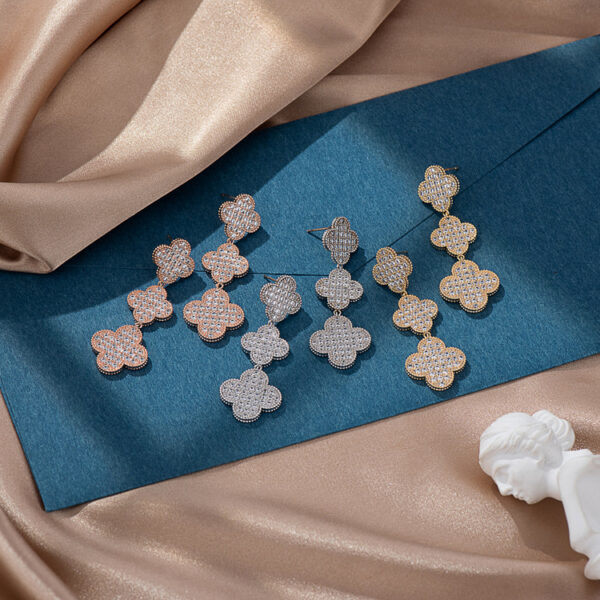 #80 The new zircon four-leaf flower earrings from Europe and America are set with personalized, high-end and fashionable stud earrings - Image 4