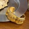 Vintage gold CC earrings, bracelet set - Image 8