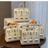 #164 A classic handbag with a color-blocked house bag - Image 10