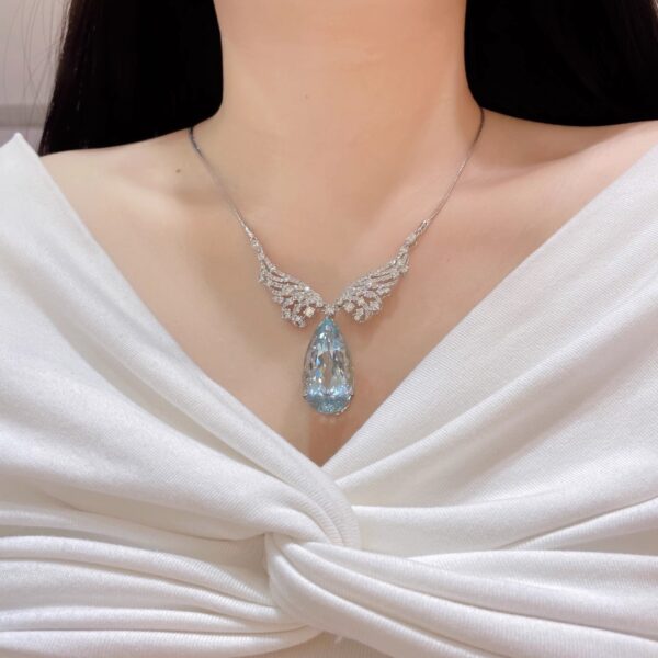 #209 Natural Santa Maria Aquamarine Necklace features a 38.98-carat 18k gold main stone set with diamonds - Image 9