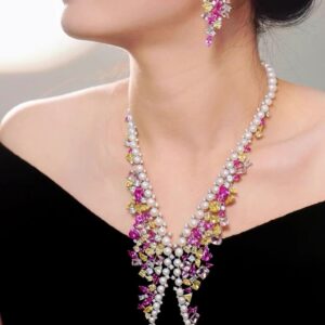 #102 925 Silver necklace and earrings with natural pearls and colored zircon