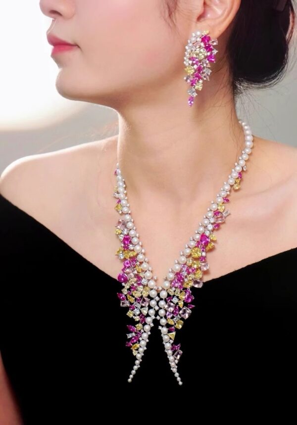 #102 925 Silver necklace and earrings with natural pearls and colored zircon