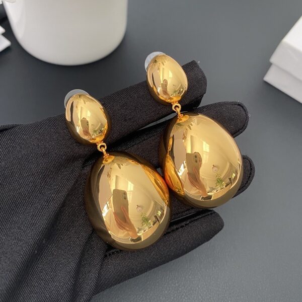 336#European and American high-end fashion design egg shaped earrings brass plated 24k gold geometric shape light luxury style personalized earrings